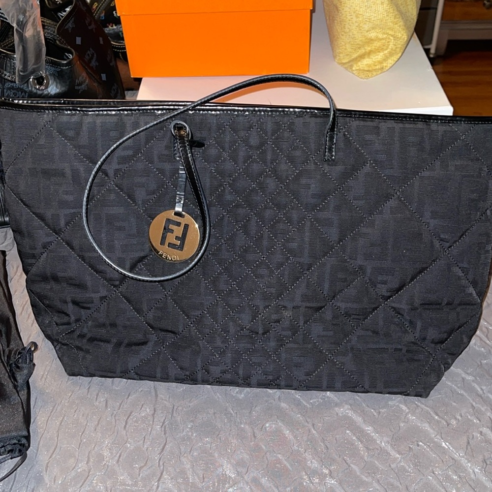 Preloved Fendi quilted black tote bag with FF charm she is nice n big great cond